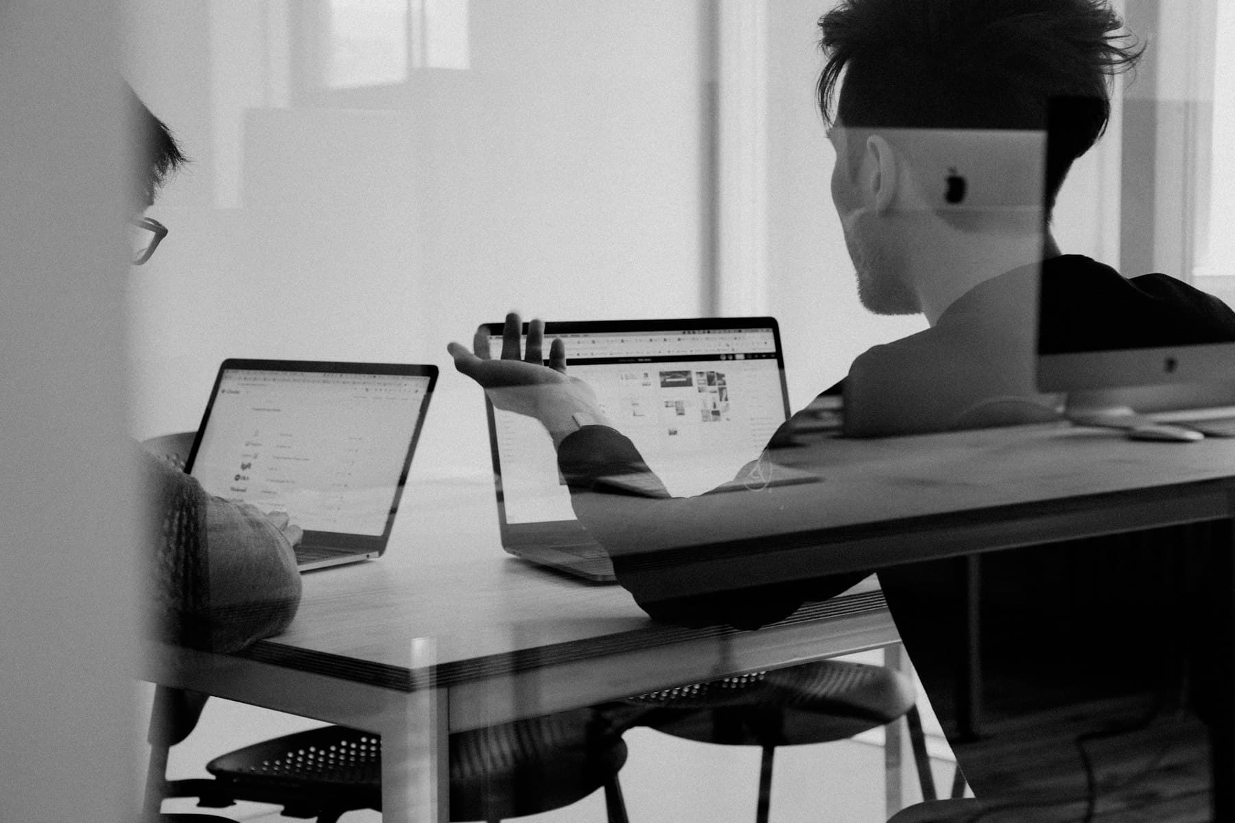 Video still: founder at desk, documentary frame